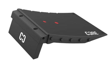 A black CORE workout bench attachment featuring red accents and various attachment points, set against a white background. This bench, ideal for both gym environments and home workouts, seamlessly enhances the stylish design of the CORE Foldable Mini Kicker Ramp with its branding logos for versatile fitness and enjoyment.