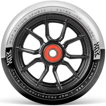 A black and white Madd Gear MFX Syndicate AR120 Dual Urethane stunt scooter wheel with branding and "MGP ACTION SPORTS | ESTABLISHED 2002" text along the rim.