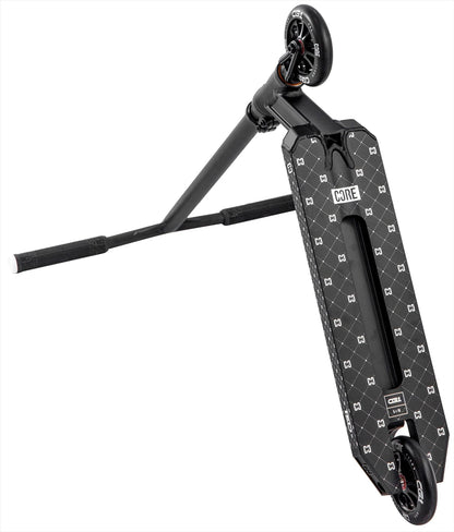The CORE CG1 Complete Stunt Scooter by CORE features a black deck with patterns, pro-style handlebars, and small wheels—ideal for beginner skatepark tricks. Shown diagonally on a white background.