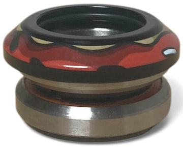 A close-up of the Chubby Doughnut Integrated Stunt Scooter Headset in black and red by Chubby, featuring a metal and plastic construction with sealed bearings, shown isolated on a white background.