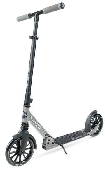 The Madd Gear Metro Cruise 250 Foldable Commuter Scooter in black and grey features large wheels, a textured foot deck, gripped handlebars, rear fender brake, and adjustable height. Shown on a white background.