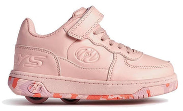 The Heelys Rezerve X2 Girls Shoes in Light Pink/Pink Confetti feature laces, a hook-and-loop strap, two wheels in the heel, a pink camo sole, and an embossed Heelys logo—perfect for beginners.