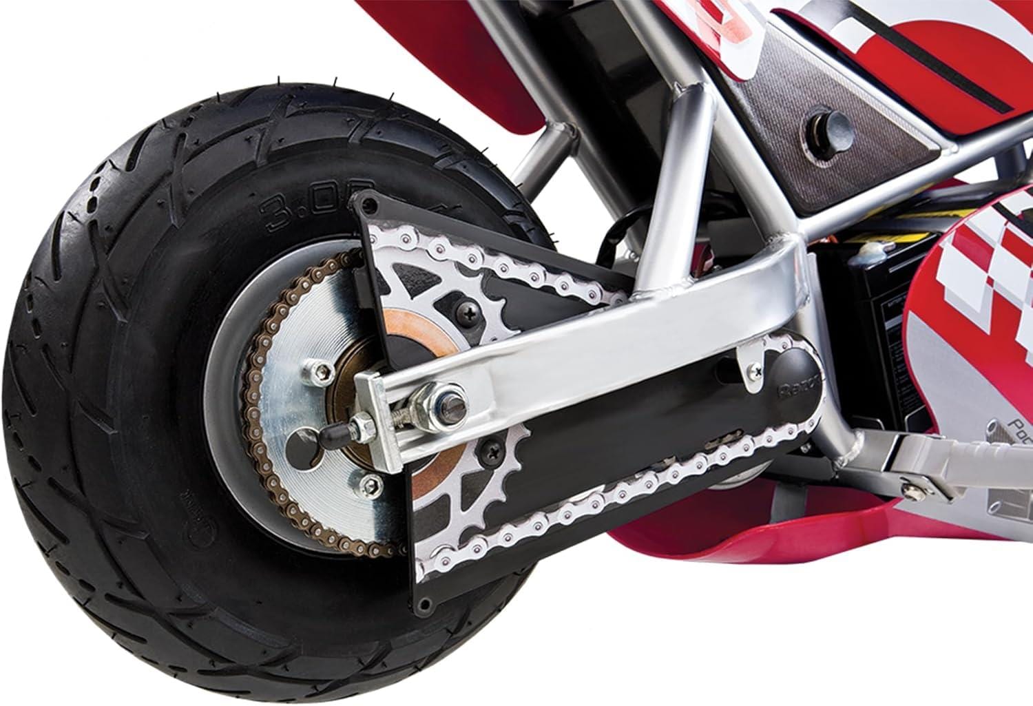 Close-up of the rear wheel and chain drive on a red Razor Pocket Rocket Electric Bike by Razor, highlighting the tire tread, sprocket, chain, and metal frame.