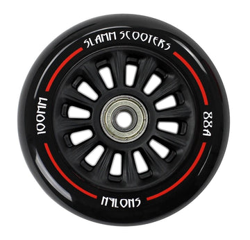 The Slamm Nylon Core 100mm Scooter Wheel - Black / Black features red and white accent lines, a silver ABEC 9 Chrome Bearing, and “SLAMM SCOOTERS,” “88A,” “100MM,” and “NYLONS” around the edge. Great for beginner riders.