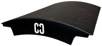 A black, curved plastic CORE Mini Wave Bridge Connector with "CORE" in white on the end—ideal for upgrading your skate setup.