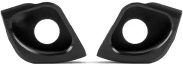 Two black, curved, leaf-shaped objects—part of the Ethic DTC Pandemonium Deck Ends Kit by Ethic—with large circular holes in the center, are positioned side by side and slightly tilted toward each other on a white background. Ideal as scooter deck replacement parts, this kit delivers both style and durability.