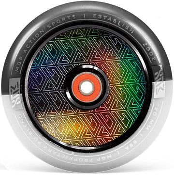 A close-up of the Madd Gear MFX Corrupt Core 120mm Stunt Scooter Wheel in Black/White, featuring a geometric rainbow design and “MGP Action Sports | Established 2002” engraving—ideal for MGP stunt scooter enthusiasts.