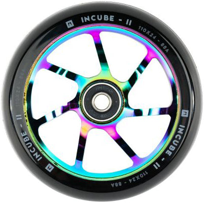 A vibrant Ethic DTC Incube V2 110mm Stunt Scooter Wheel in a rainbow iridescent finish, featuring a black tire, bearing, slim metal spokes, and "INCUBE-II" branding on the rim. This Ethic wheel blends eye-catching style with dependable performance for your scooter.