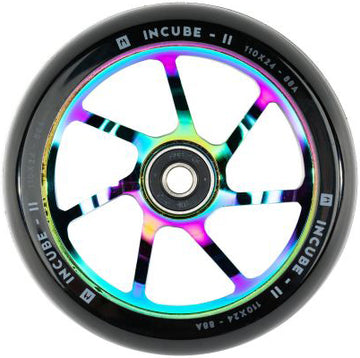 A vibrant Ethic DTC Incube V2 110mm Stunt Scooter Wheel in a rainbow iridescent finish, featuring a black tire, bearing, slim metal spokes, and "INCUBE-II" branding on the rim. This Ethic wheel blends eye-catching style with dependable performance for your scooter.