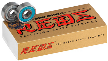 A gold and red "Bones REDS Big Balls Skateboard Bearings - 16 Pack" box features two Bones bearings—one upright with a blue seal, one flat—highlighting their six-ball design for greater speed and durability. Brand: Bones.