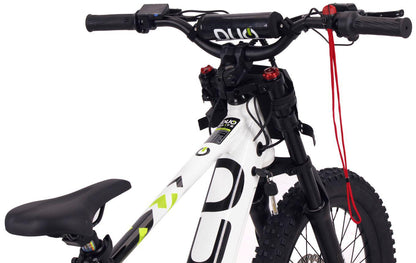 Close-up of the Duo 20" Blitz Kids Electric Balance Bike in White/Black, showing the handlebars with a red cable, front suspension fork, and parts of the seat and frame by Duo.