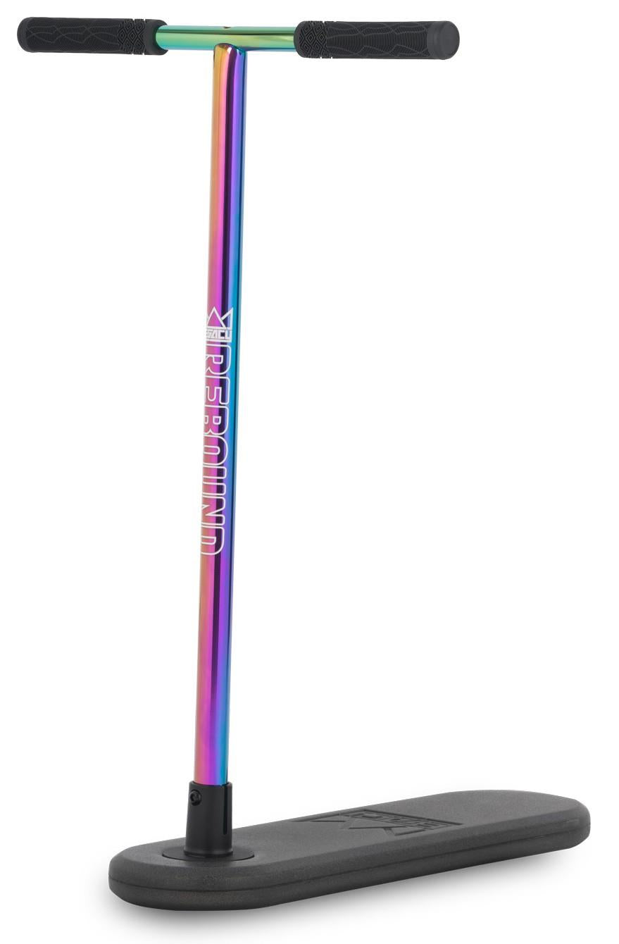 The Legacy Rebound Indoor Trampoline Scooter - Neochrome by Legacy features a T-shaped neochrome handlebar with a metallic rainbow finish, black rubber grips, and a black foot platform to add fun to your workout routine.