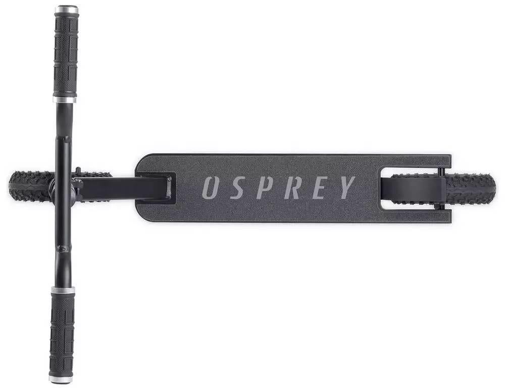 Top view of the Osprey Complete Dirt Scooter - Black by Osprey, featuring a wide deck with textured grip tape, large pneumatic wheels, and handlebar grips on both ends.