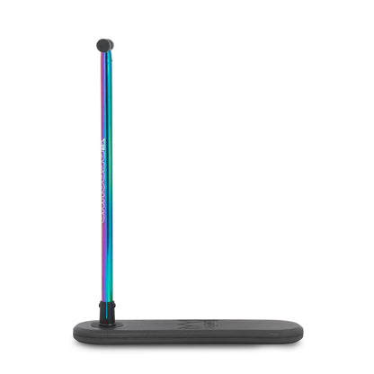The Legacy Rebound Indoor Trampoline Scooter - Neochrome by Legacy stands upright with its neochrome bar and round black tip on a flat black base, resembling a scooter, against a white background.