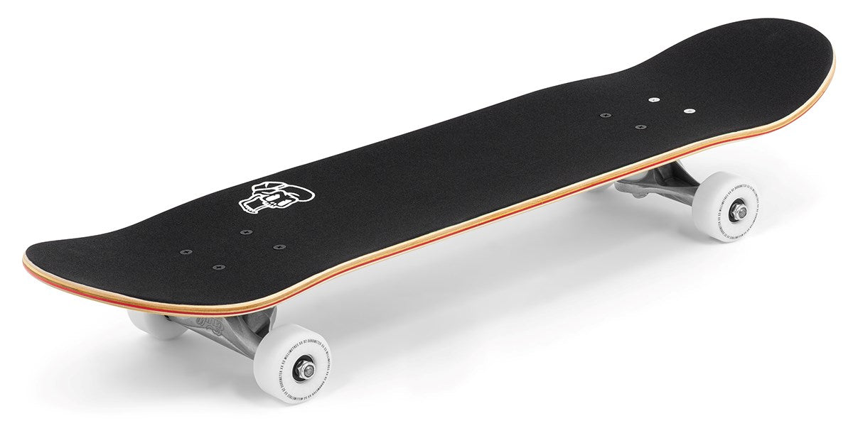 The Enuff Lucky Cat Natural Complete Skateboard (8.0" x 32") features white wheels, silver trucks, a layered wood finish, and a white skull graphic on the grip tape—ideal for beginners in street and park skating.