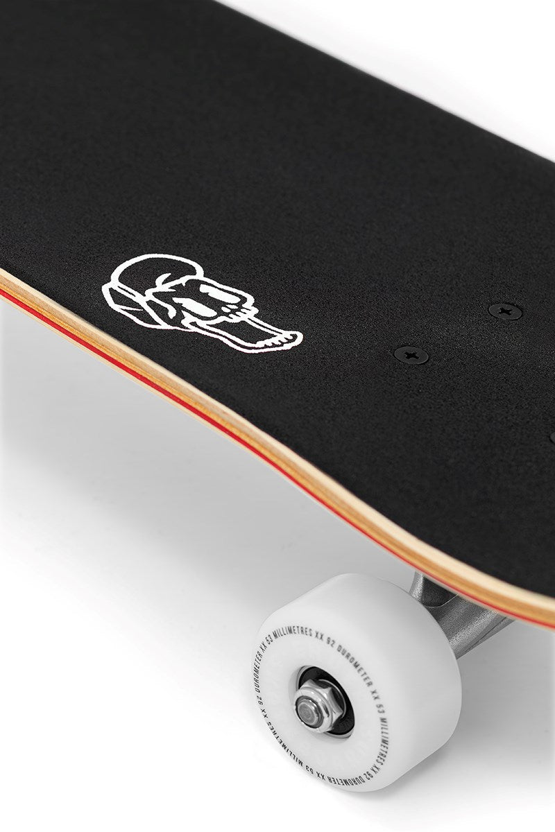 Close-up of the Enuff Lucky Cat Red Complete Skateboard (8.0" x 32") featuring black grip tape, a wooden deck edge, white wheels with silver hardware—ideal for street and park skating.