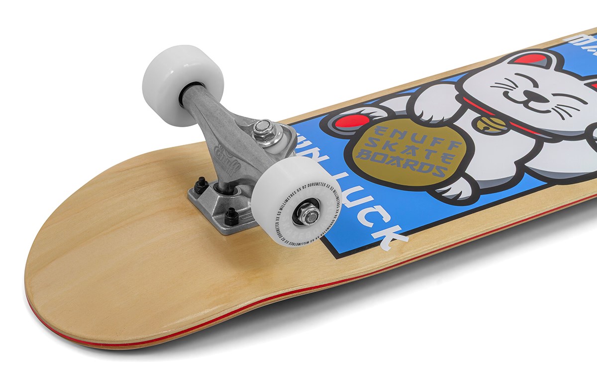 Close-up of the Enuff Lucky Cat Mini Natural Complete Skateboard - 7.25" x 29.5", a great beginner kids' board from Enuff, featuring white wheels and a smiling lucky cat graphic with "Good Luck" on the deck.