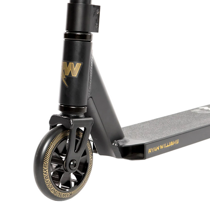 Close-up of the Nitro Circus Ryan Williams Signature Replica 2025 Complete Stunt Scooter in black, featuring gold accents and highlighting the wheel, fork, and "Ryan Williams" branding on the deck.