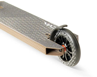 Close-up of the Madd Gear Viral KAOS Complete Stunt Scooter - Ash shows the rear wheel with a black rim and white graphics, a small rear fender, and a textured deck for grip.