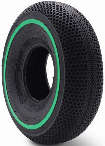 The Wildcat Original Pro 10" Mini BMX Tyre by Wildcat features a solid black design with a green sidewall strip and honeycomb pattern, offering durability and shock absorption for scooters or Wildcat Pro Mini BMX bikes.