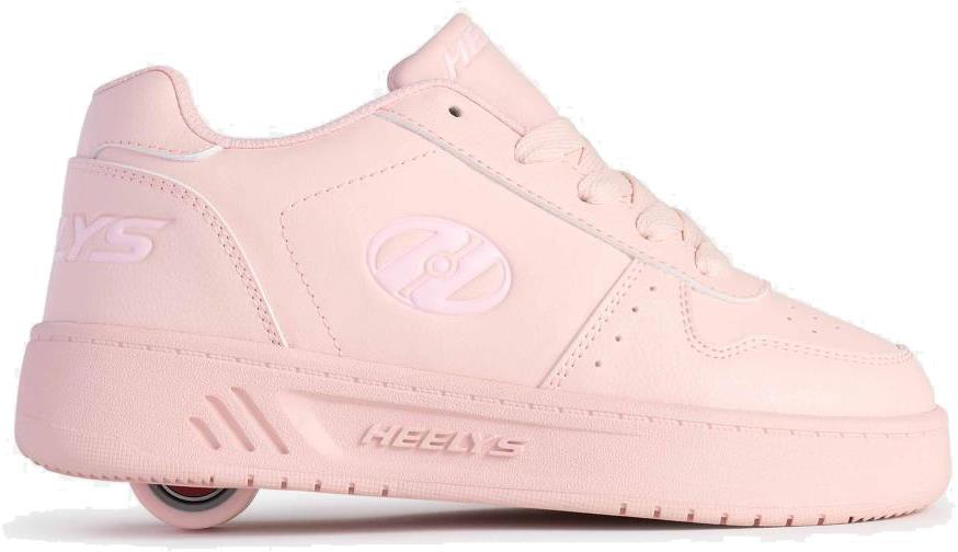 The Heelys Kama Girls Shoes - Pink combine classic court style with fun, featuring a light pink design, single low-profile wheel in the heel, lace-up front, and side logo.