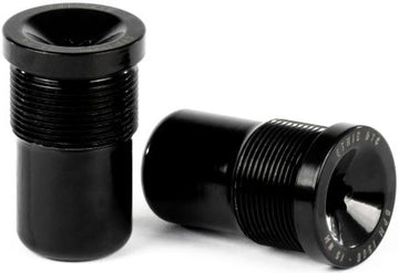 Two black cylindrical metal objects with threaded midsections are displayed—one upright, the other lying horizontally to reveal engraved text on its flat end. Both feature a flared rim and a glossy, smooth finish. These Ethic DTC Handlebar Balance Point Modulation - 150g bar ends by Ethic are expertly crafted to provide riders with exceptional durability and precise balance point modulation.