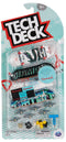The Tech Deck M01 Deluxe 4 Pack Fingerboards - Diamond includes four authentic fingerboards, tiny wheels, tools, stickers, and a Diamond case for ages 6+, all in clear packaging.