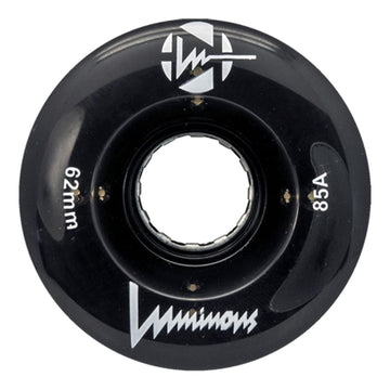 The Luminous LED 85A Quad Roller Skate Wheel in black features white logos, "62mm" left, "85A durometer urethane" right, and "Luminous" script at the bottom. Central hole fits standard skate wheel bearings. Brand: Luminous.