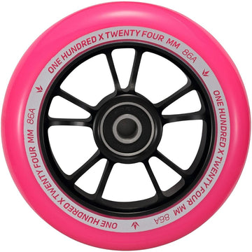 Close-up of the Blunt Envy 100mm Stunt Scooter Wheel in black and pink, featuring an aluminum core with ABEC 9 bearings. White text on the inner rim reads "One Hundred x Twenty Four mm 86A." The wheel showcases a sleek black hub with multiple spokes.