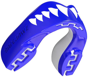 The Safejawz Extro Series Protection Mouthguard - Shark by Safejawz features a blue design with white stylized teeth, "SAFEJAWZ" embossed on the side, and provides hi-impact protection for athletes.