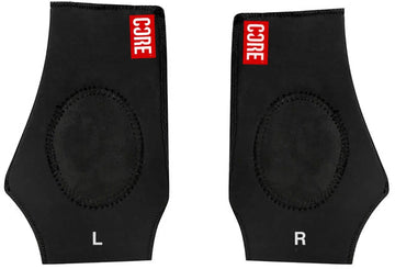 The CORE Ankle Skate Protection Sleeve - Black comes in a pair, featuring "CORE" branding at the top in red. Designed for extreme sports, these supports have shock-absorbing gel for cushioning every step. The left sleeve is marked with "L" and the right with "R," ensuring a precise fit and comfort.