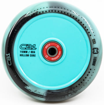 Close-up of the CORE CB1 110mm Nylon Stunt Scooter Wheel in Black/Teal, featuring a hollow core, red bearing, and glossy finish—ideal for beginner riders.