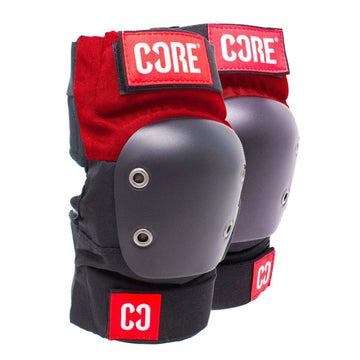 Introducing the CORE Pro Elbow Skate Protection Pads in red and black, these pads feature sturdy black shells with visible circular rivets for reinforcement and prominently display the "CORE" logo on the top strap. Perfectly engineered for skateboarding protection, they are pro-rider certified and promise outstanding durability along with extreme impact resistance.