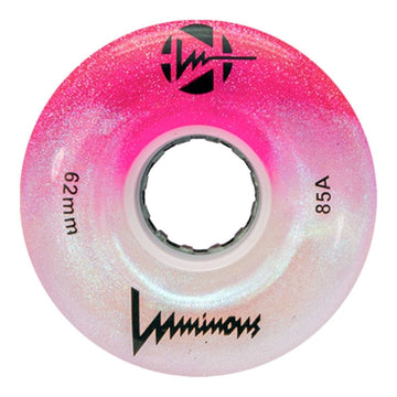 The Luminous LED 85A Quad Roller Skate Wheel in Cotton Candy (62mm) by Luminous features a pink and white glittery finish, stylized branding, “85A” durometer, and a center hole for the axle.