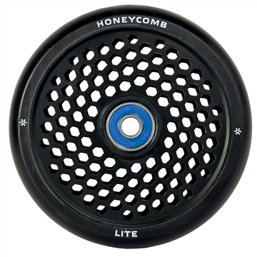 The Union Honeycomb Lite 110mm Stunt Scooter Wheel in black features a lightweight honeycomb center design, blue bearing, and "HONEYCOMB" and "LITE" printed along the outer edge.