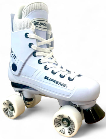 The Supreme Turbo 33 Nylon Quad Roller Skates feature a high-ankle white boot with "SUPREME" branding, white laces, white wheels, black accents, and a black toe stop. The background is plain white. Brand: Supreme.