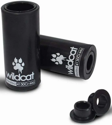 The Wildcat Pro Mini BMX Pegs - Black include two Chromoly pegs with Wildcat branding and a paw print, plus two small black adapters. Designed for bike axle installation, they're built for durability.