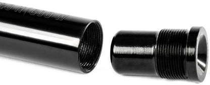 The Ethic DTC Handlebar Balance Point Modulation - 150g by Ethic is displayed on a white background, featuring a black metal pipe with internal threads beside a matching black threaded cap, perfect for use as a scooter bar end or in Ethic DTC setups.