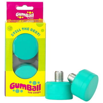 The Gumball Roller Skate Short 17mm 83A Toe Stops in Mint Blue feature a vibrant package with two teal stops made from a proprietary rubber blend against a yellow and pink box. The open box highlights one stop with bold text and playful graphics, showcasing their stopping power.