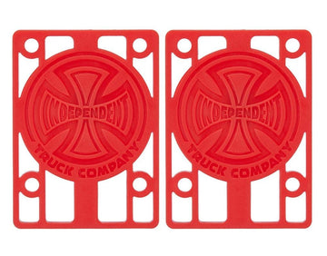 Two red Independent Skateboard Riser Pads, each measuring 1/8", showcasing the "Independent Truck Company" text and the iconic cross logos at the center. These durable risers are designed with pre-drilled holes for effortless mounting on your Indy trucks.