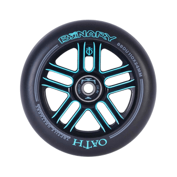 The Oath Binary 110mm Stunt Scooter Wheel in Black / Blue highlights a sophisticated black design paired with turquoise accents and lettering. The inner hub is adorned with a geometric pattern, while the tire boldly displays the "OATH" branding. Equipped with premium Oath Fidelity bearings, this 88DU 110x24mm wheel provides exceptional impact resistance.