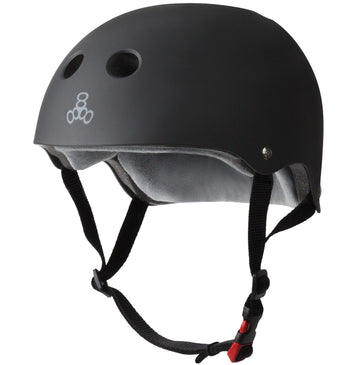 The Triple 8 Certified Sweatsaver Skate Helmet in black is ideal for extreme sports, featuring a sleek design with dual ventilation holes and a comfortable inner padding. It provides dual-certified protection and includes an adjustable chin strap with a quick-release buckle.