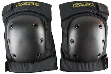 A pair of Harsh Pro Park Knee Skate Protection Pads in black features impact-resistant hard plastic shells and adjustable straps, with the brand name "Harsh" highlighted in yellow at the top. The durable design includes multiple rivets on each pad for added strength.
