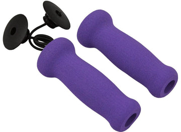 A pair of JD Bug Original Street Foam Scooter Grips - Purple, featuring two super soft purple foam handlebar grips linked by a black elastic cord, each equipped with black circular stoppers at the ends. Ideal for enhancing grip strength or using as JD Bug scooter handlebar grips, all set against a plain white backdrop.
