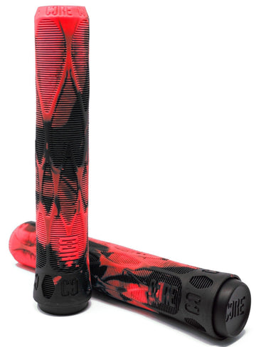The sentence can be rewritten as:

A pair of interlocking CORE Pro Lava Red / Black Stunt Scooter Grips, measuring 170mm, features a red and black camo pattern with ribbed textures for enhanced grip. The "CORE" branding is displayed on both the ends and body. Crafted with a shock-absorbing compound for impact protection, these grips are showcased both vertically and horizontally against a white background.