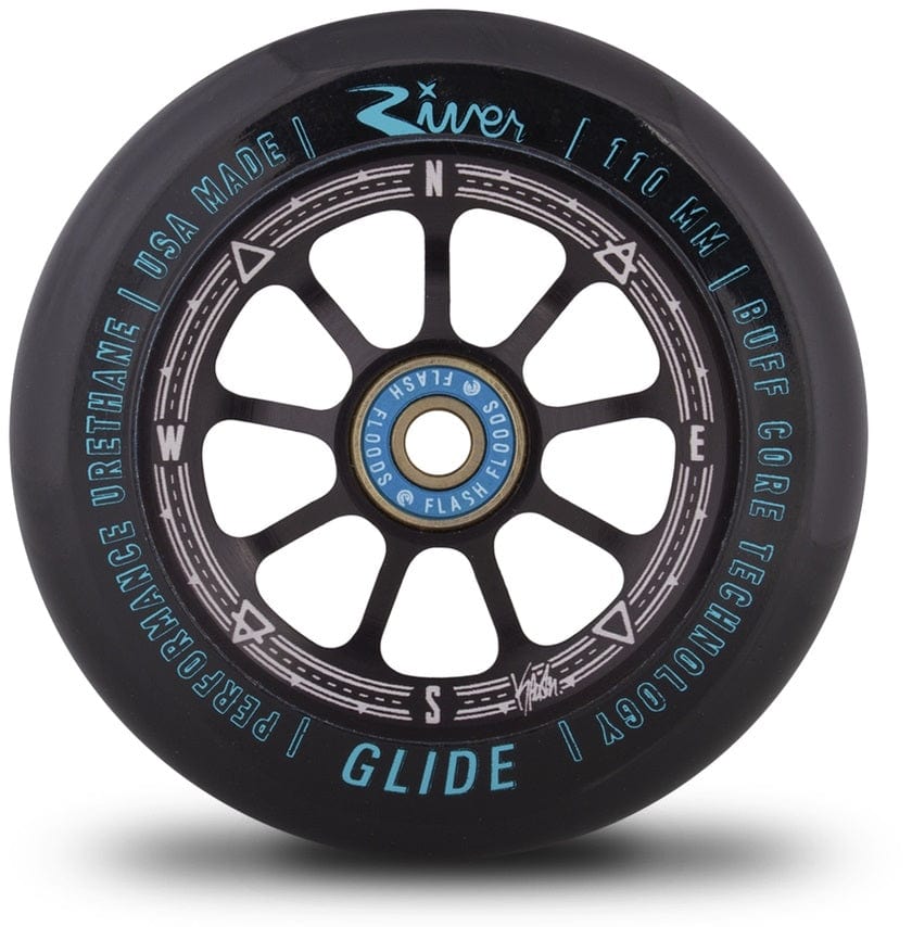 The River Glide Signature Kevin Austin 110mm Stunt Scooter Wheels feature an elegant black design with prominent River branding and a distinctive compass-inspired blue and white central hub. Made from anodised 6061-T6 aluminium, they incorporate buff-core technology and performance urethane, highlighting their quality craftsmanship in the USA.