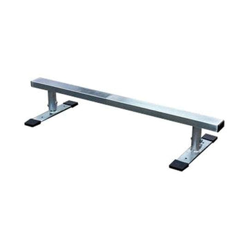 The Rampage Mini Skate Grind Rail - 90cm features a sleek silver finish with black end caps, supported by two flat bases, making it ideal for beginner skaters looking to practice their skateboarding tricks.