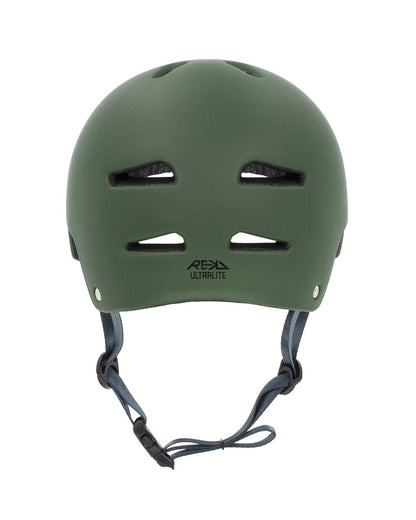 The REKD Ultralite In-Mold Skate / Scooter Helmet in green is perfect for action sports. It showcases a matte green exterior with black interior padding, front ventilation slots, and an adjustable grey chin strap with a buckle. The helmet prominently displays the "REKD" branding on the front.