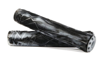 Two Ethic DTC Black/White Stunt Scooter Grips, measuring 170mm each and made from durable thermoplastic rubber, are displayed on a white background. Their textured surfaces include a ribbed pattern and zigzag design, with one grip laid across the other for emphasis.
