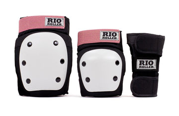 The Rio Roller Triple Skate Protection Pad Set - Black / Rose by Rio Roller includes a ramp-style set with dual splint wrist guards, black knee pads, and elbow pads. The gear features white plastic shields and rose-colored fabric accents for added flair.